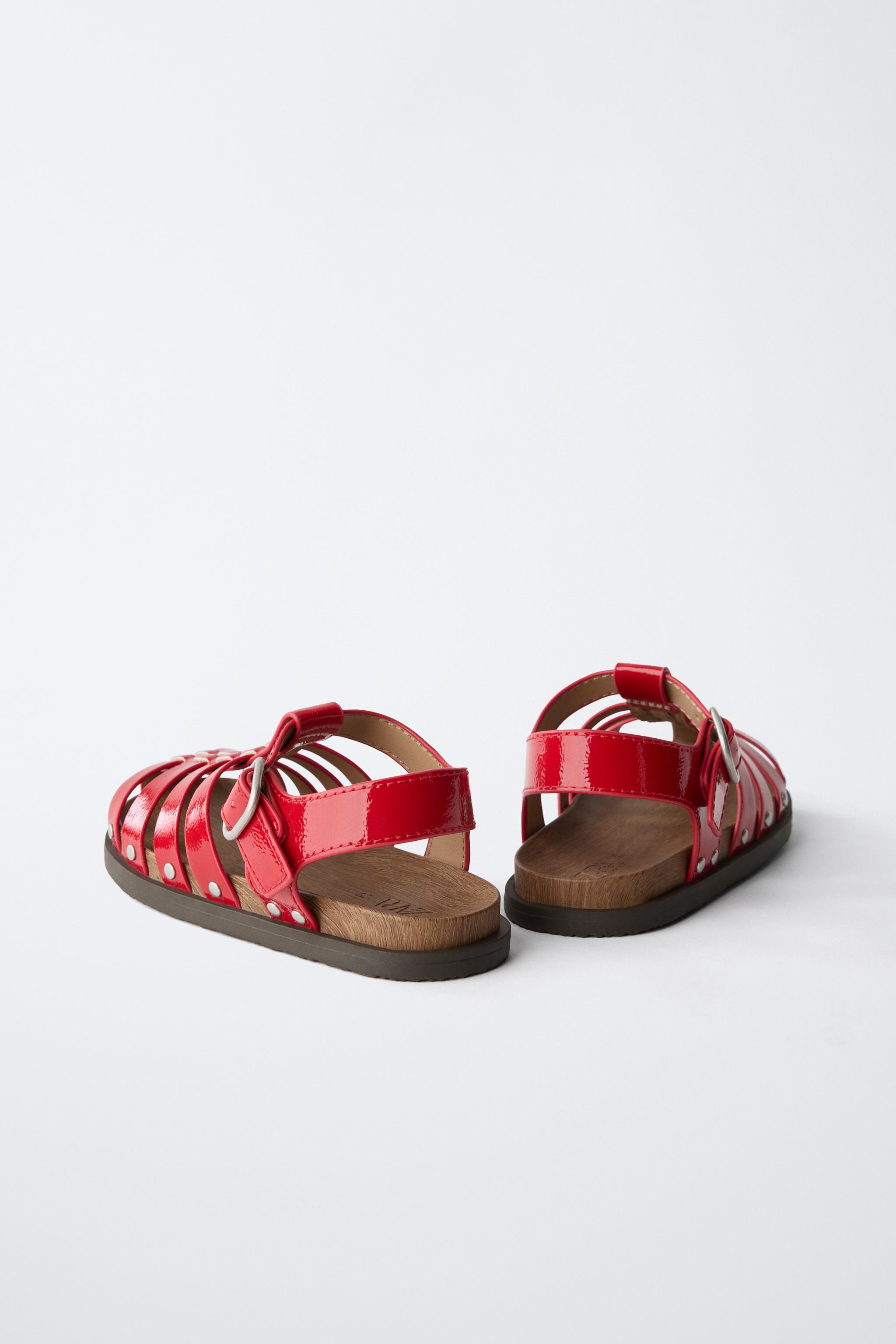 STUDDED FISHERMAN SANDALS